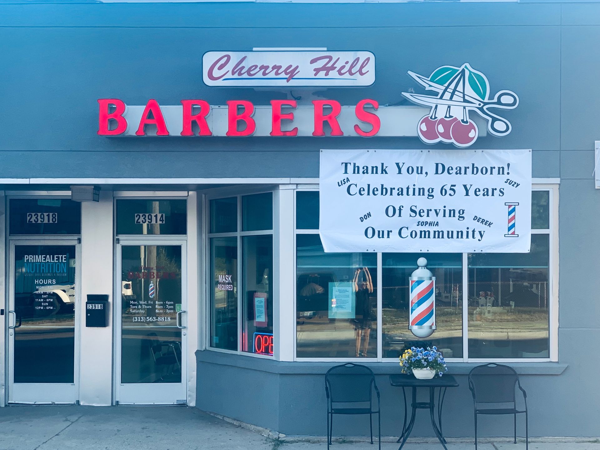 Cherry Hill Barber Shop Main Area with Stylists in Dearborn, Michigan.